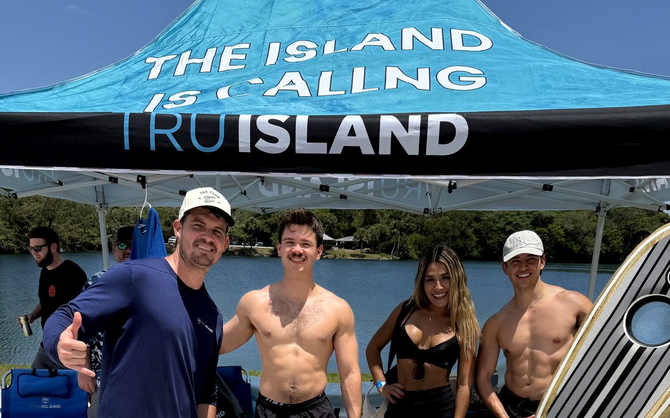 Michael Weppner with the TruIsland team on the water